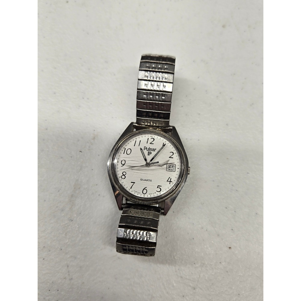 Pulsar V147-8009 A1 Mens Quartz Watch Silver Tone White Dial Date Stretch Band